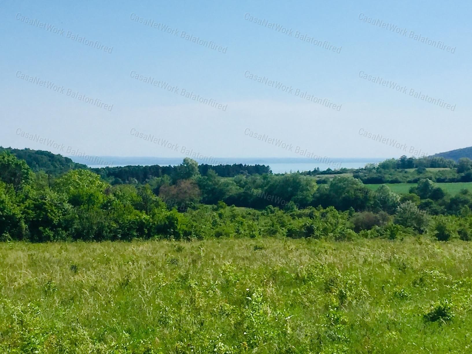 Beauty of Lake Balaton and Surrounding Mountain Range